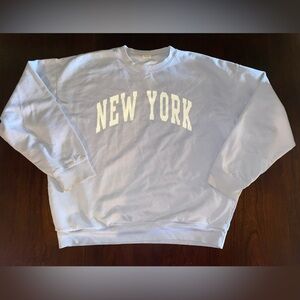 John Galt (Brandy Melville) light blue long sleeve sweatshirt. New York.